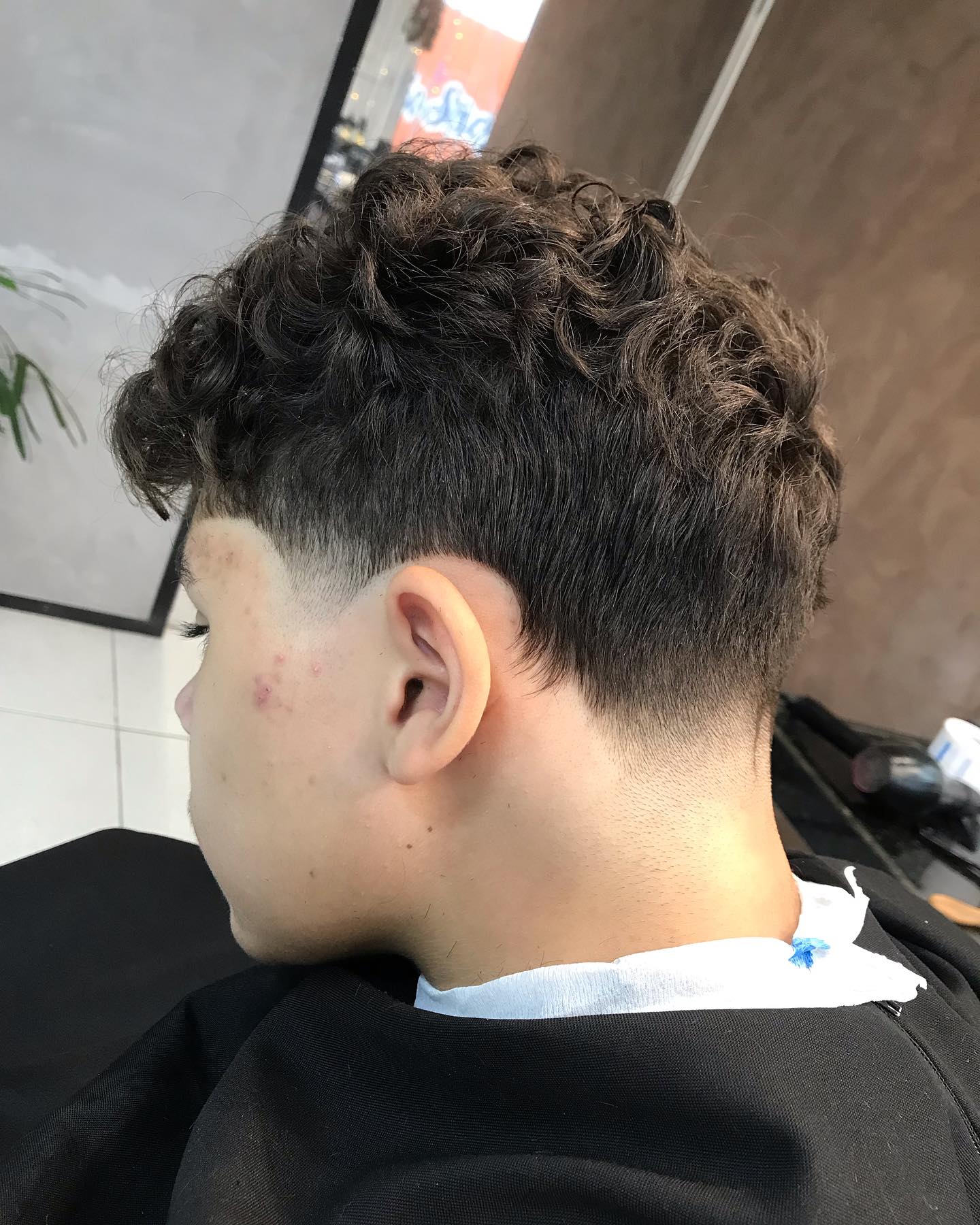 Resultado final de corte com acabamento impecável na Barbearia do Mister